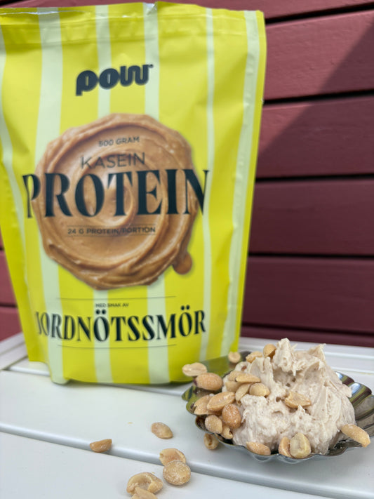 Luftigt proteinfluff av POW kaseinprotein jordnötssmör i skål, nötfritt