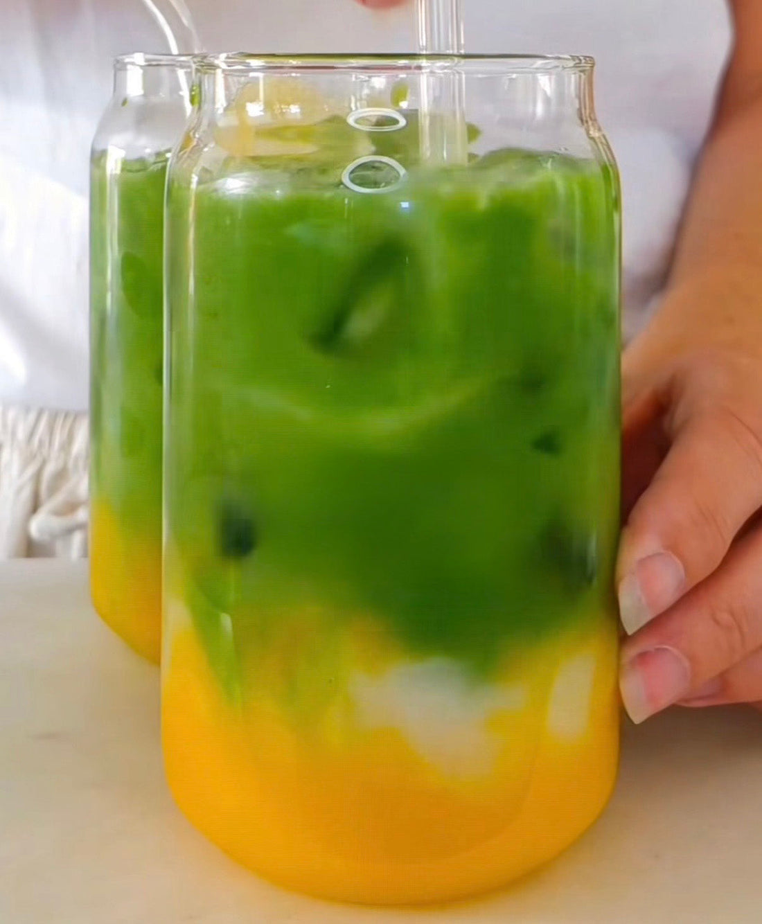 Proteindrink med mango, kokos och matcha-citron, gjord med POW clear whey citron